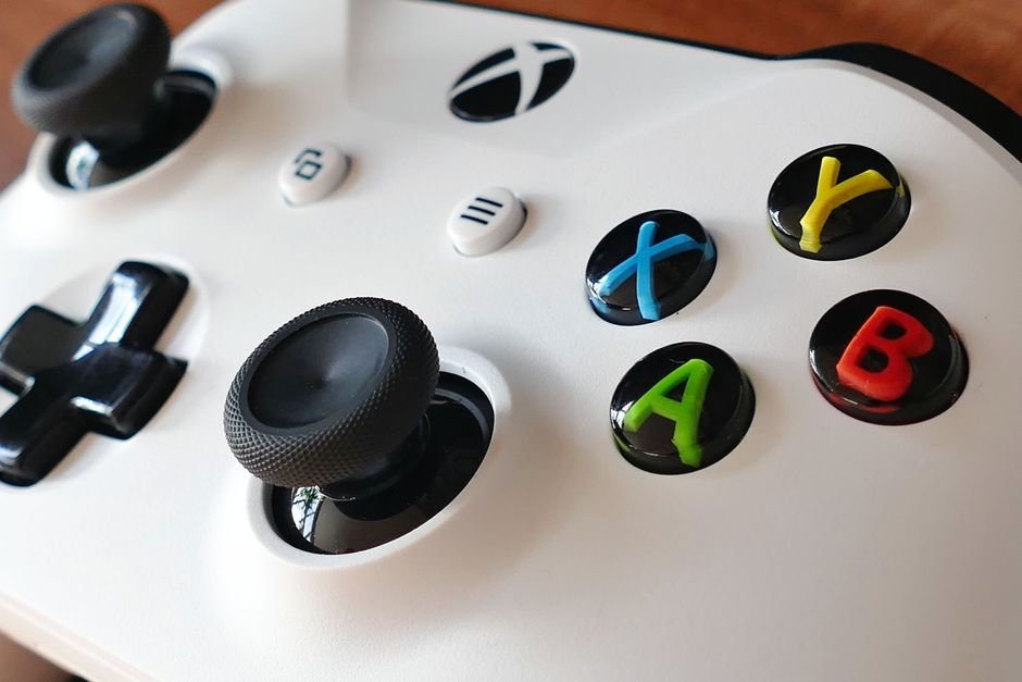 Common Xbox Faults & How to Fix Them Close-up image of an Xbox controller highlighting buttons and joysticks.